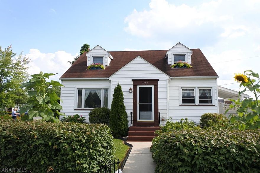 Cute Cape Cod on a corner lot in convenient Garden Heights. Functional floor plan, 2 bedrooms on the 1st floor and 2 on the 2nd....one is Knotty Pine and would make a great office.  This home features great mechanics, a new furnace, C/A and hot water heater.  Outside, you could literally live off the land! Raised beds are found around the entire property....vegetables of all kinds, fruit trees, berries and much, much more...you'll be amazed. Want more yard space?  The beds can be converted back to lawn. The yard is fenced in and sports a private patio and sitting area, another fenced space offers a new hot tub. Also included are the kitchen appliances, washer, dryer, sauna, blinds a a win. A/C unit (if you don't want to use the C/A). Driveway and sidewalks have been recently updated, too.