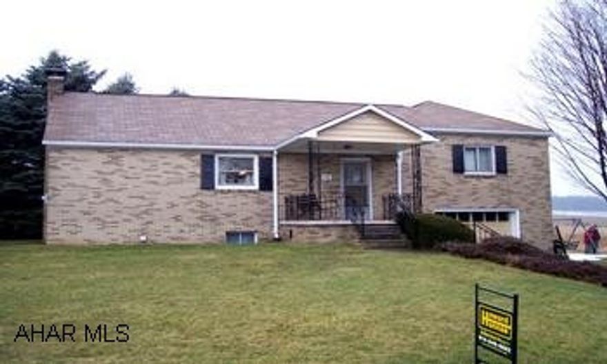 One owner and well maintained brick home on half acre of privacy!  2008 improvements include interior and exterior paint, laminate flooring in kitchen and bath, kitchen sink and countertops, commode and vanity.  City water, septic. Coal/wood furnace PLUS oil fa ready for hook-up.  Beautiful built-ins in bedrooms.  Plaster walls, whole house surge protector, 1 outbuilding with electric.  Attached garage has electric and water.  Excellent location and move in condition make this an excellent value.  Electric averages $45/mth, water $10/mth.  Mining notice on file with agent.