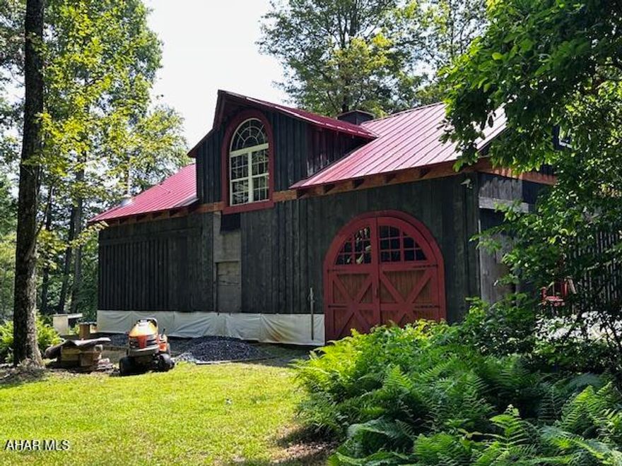 Serenity and Convenience are the best words to describe 538 Two Mile Road Howard PA. Located in 'The Woods at Sand Ridge' Development. It is a 30 minute drive to State College, Bellefonte, and other outlying areas of interest. This 12.93 acre property is absolutely beautiful and filled with peace and quiet. The 30 x 50 Story & Half Barn has a catwalk and two master bedrooms and one bath that is plumbed out and ready for your finishing touches. All of this potential just adds to the splendor of this property. This would be the perfect place to build your 'Barndominium Dream Home'. Whether you envision a cozy farmhouse retreat, a stylish modern loft, or a family haven with plenty of room to grow, this property provides the space and structure to make it happen. The combination of energy-efficient materials, low-maintenance design, and warm, inviting character makes it not just a house, but a lasting investment in comfort and creativity. All that's missing is your personal touch to turn this barndominium into the home you've always imagined. This property is sub-dividable.