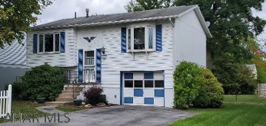 Great Bellwood Borough bi-level, 1509 W. Antis St, priced to sell! 2 BR, 1 BA, finished FR w/walkout to covered porch, nice back yard, storage shed. Home is ready for your TLC.