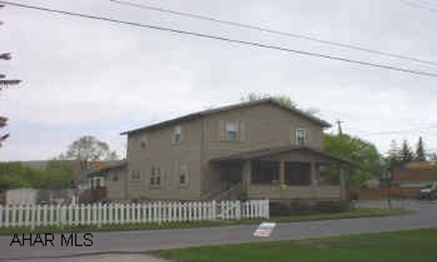 Vinyl sided 4-5 bedroom home on large corner lot. 2 decks, large eat-in kitchen, 2 car garage, and many amenities.