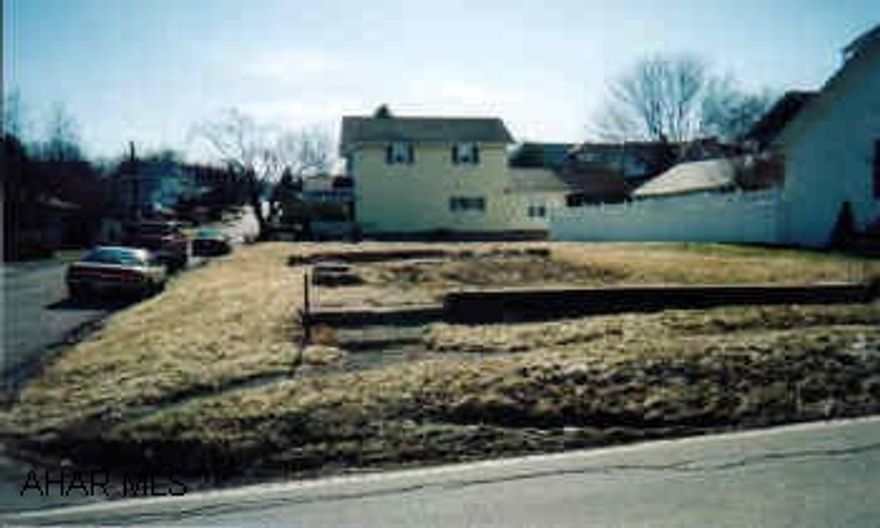 Nice level home site.  Possible sectional.  According to city utilities available.  4873.8 sq. ft.  Pleasant Valley area.