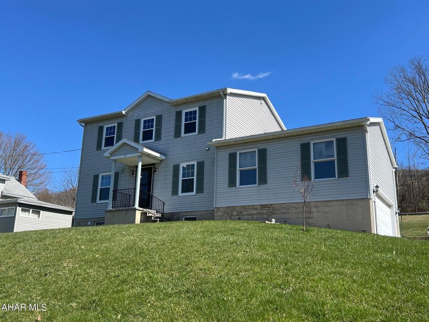 Don't miss this updated move-in ready home, located minutes from I99 for an easy commute to State College, Altoona, or Philipsburg. This 3 BR, 1.5 bath 2-story home has some great features that include an updated chef's kitchen with an abundance of counter space and soft-close cupboards and pull out drawers, double pantries, center island, and brand new dishwasher and refrigerator.  Main floor also features 1/2 bath, living room and bonus/play room that could also be an office. Off the kitchen is the huge deck, patio and spacious, fenced back yard large enough for a garden and/or pool. On the 2nd floor you will find a primary BR with walk-in closet, main bath with a full tub AND walk-in shower along with dual sinks, another bonus room/office and 2 additional bedrooms. Almost all of the rooms  have been freshly painted and brand new windows installed throughout (with the exception of the garage.) Make sure you check out the stunning mountain views! Come take a look for yourself...call for an appointment to see this great home.