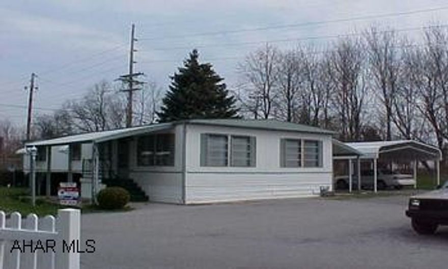 1970 Herrli A Doublewide.  Very good condition.  2 patios and new 2 car carport, Dish network, hot spigot.  Lot rent $255/month includes trash.  Renter to be approved by Trailer Court.  55 or older. 1970 Herrli A Doublewide.  Very good condition.  2 patios and new 2 car carport, Dish network, hot spigot.  Lot rent $255/month includes trash.  Renter to be approved by Trailer Court.  55 or older.