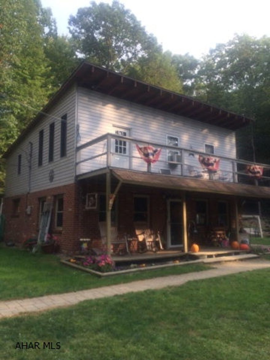 Private location on 2 acre wooded lot near Prince Gallitzin State Park. Close to State Game Lands. House has country look and is in good condition. Priced to sell.