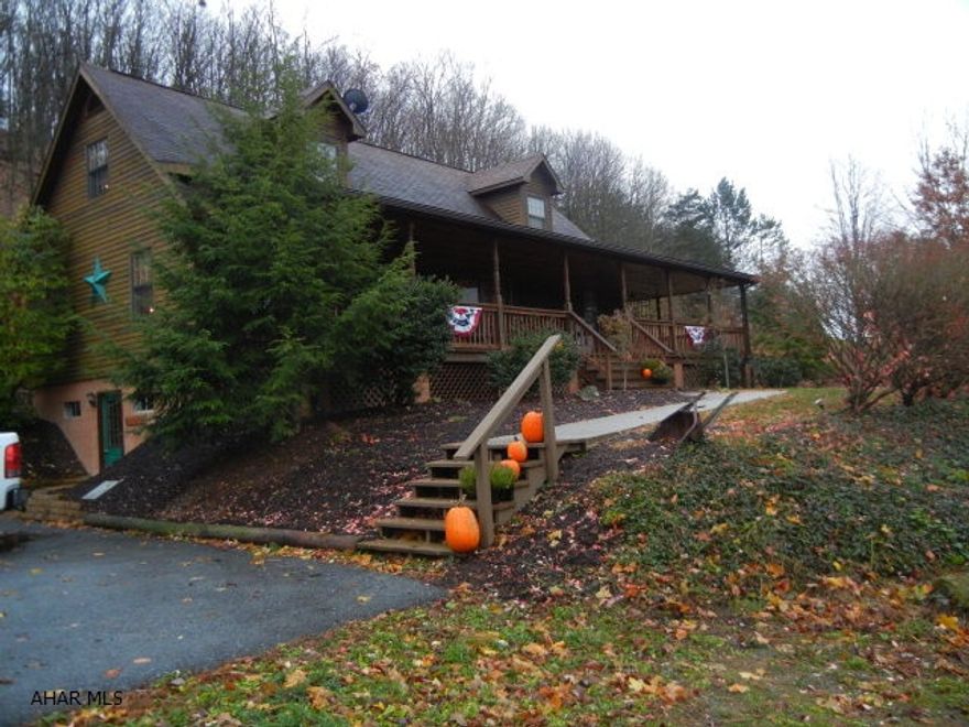 Lovely rustic frame home on 2.99 acres w/ great view.  Basement room could be finished.  New barn (24x32) with water and separate electric service accessed from Slate Hill Road.  Currently used to house goats, (animals will be gone by 11/24/11).  This could be used for other animals, or converted to a workshop.  Pellet stove in dining room heats whole house, or use oil furnace.  Home warranty.  Oil furnace new in 2005.  Pellet stove new in 2009.  Possible delayed possession; call L/A for details.