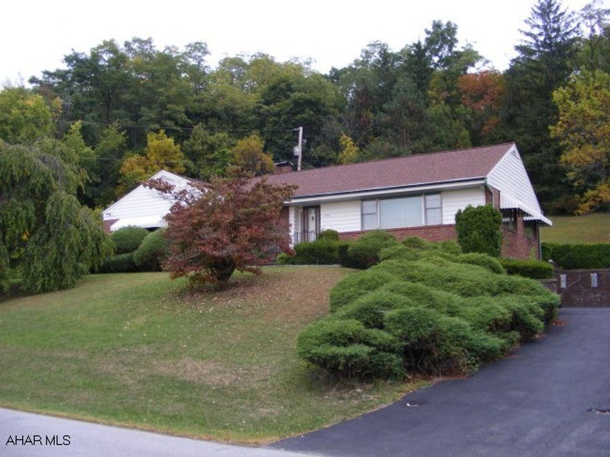Well built Brick Home. Hardwoods throughout, Art Deco style kitchen with metal cabinets and stainless steel countertops. Huge Living Room with large picture windows. Walk in 10x6 cedar closet for additional storage, large laundry room and storage on lower level - Needs some updating. Terrific private double lot.