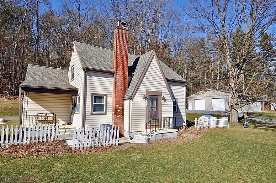 Centrally located between State College and Altoona, sits this charming home on 2.41 acres! Inside you will find updated bathrooms, original hardwood floors (recently refinished), and an upgraded 200amp electrical system. Enjoy central air-conditioning on the hot summer days and a cozy pellet stove on the cold winter days. Outdoor upgrades include a new french drain surrounding the house and a new roof in 2015. Also located on the property is a newly built 60 x 40 detached garage. This impressive building has both electric and water supply and is perfect for any type of hobby or side business. The property as a whole is a perfect balance of home, garage, play area and a private wooded lot.