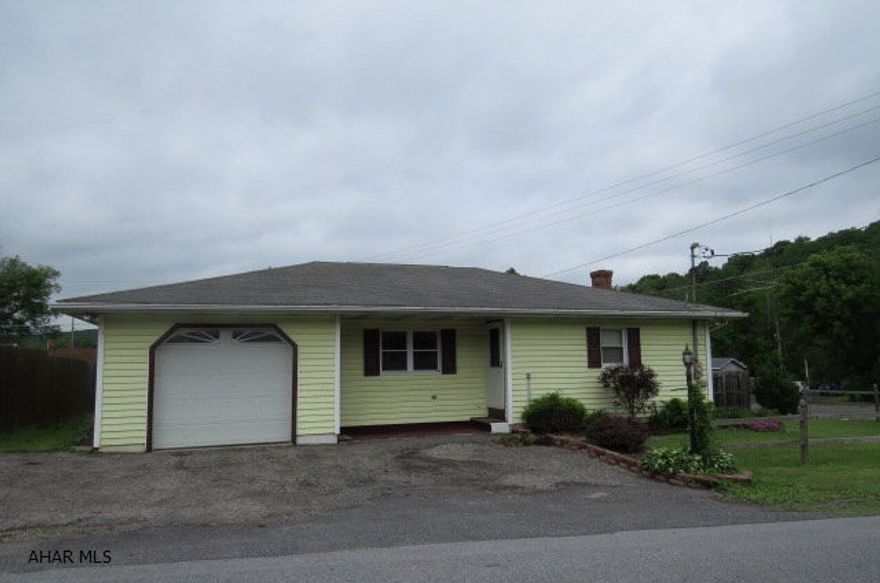 Located on a corner lot with newer siding and windows. This house just needs someone to make it a home. The kitchen is spacious and flows into the living room. Convenient first floor laundry with updated bathroom, large flat yard and Bellwood School District are just some of the features this house has to offer.