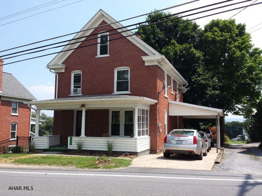 Remodeled 2 1/2 story, 3 bedroom brick home in Warriors Mark. New bathrooms. Thermopane windows. First floor laundry. All appliances stay. Carport.