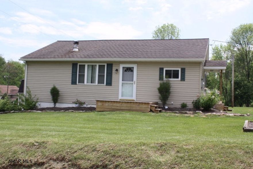 If you like being in the country and a quiet setting, take a look at this property.  House has been totally updated, has 2 fireplaces, 1 propane in livingroom and 1 wood burning in the basement for extra heat or emergencies, has awesome landscaping and the One car garage has 2 nice size add on's for work shops or extra storage.  The large backyard is great for play, cookouts or entertaining.  Call it Cozy or call it yours, take a look today.