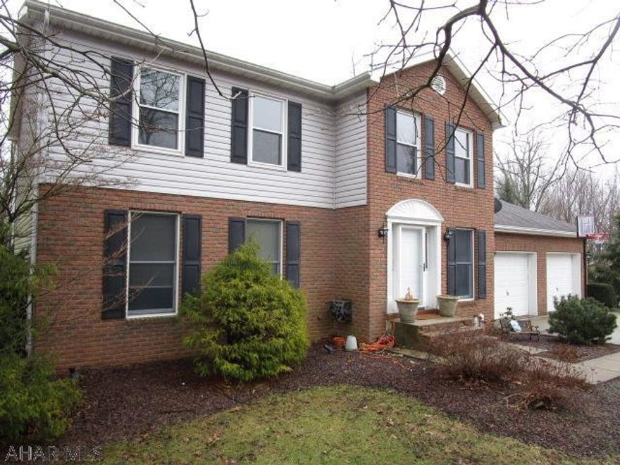 Large home on a private lot in the Sylvan East Development.