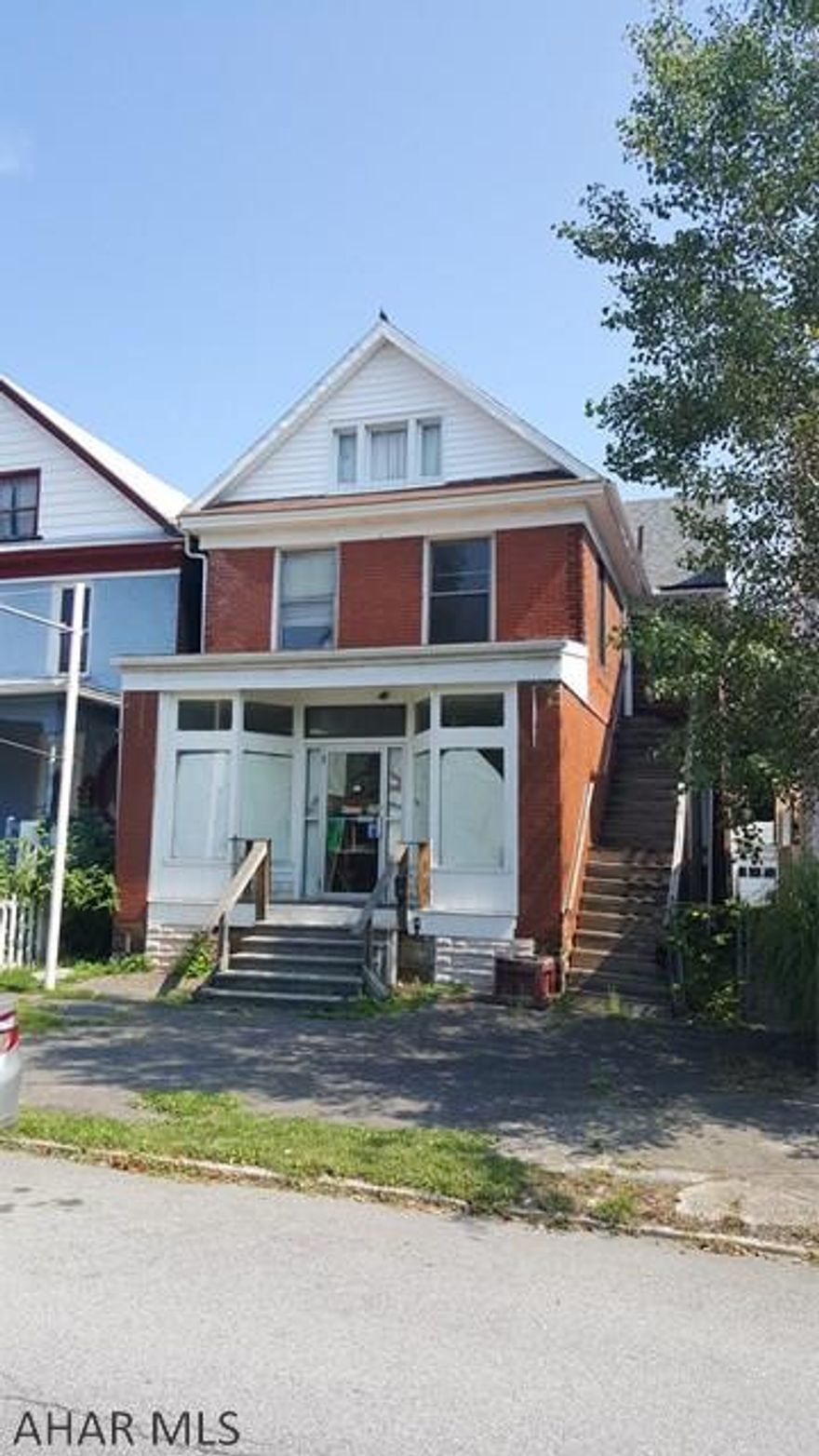 Investors!  Very unique, store front property in the heart of Juniata.  The main show room is 18 x 25, with a large warehouse/workshop in the rear.  The second floor is currently a vacant, 2-3 bedroom apartment with stove and refrigerator included.  The first floor could easily be converted into a salon, convenience store, office space or made into an open floor plan apartment, providing not one but two rentals. Three off-street parking spaces are available at the rear of the building. The property is within walking distance of the Norfolk Southern shop's in Juniata, and close to the Penn State Altoona Campus.  With so many possibilities, this property is only limited by your imagination!  Call the listing agent today for your private showing.