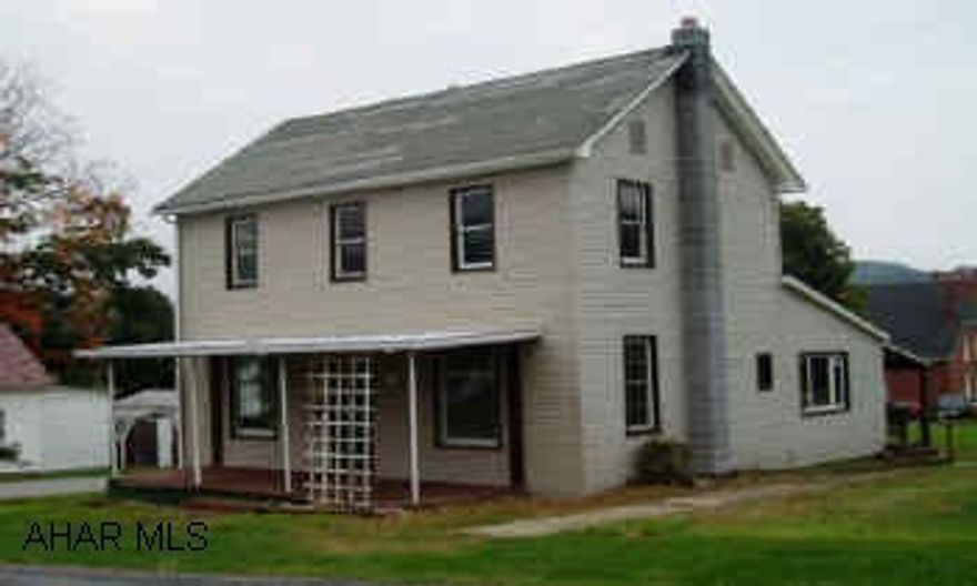 Large 2-story frame/vinyl house on two lots located in quiet residential area of Saxton. Most windows are thermopane, upgraded electric and plumbing. Full unfinished basement, double lot, 1st floor laundry.