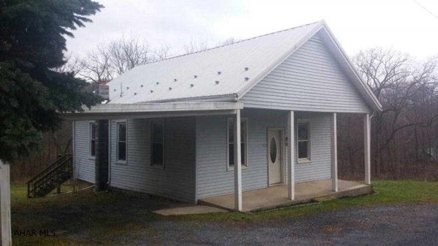 Quiet setting on almost 1 acre! Newer drywall, ceilings, floors, cabinetry. Newer hot water tank and electrical panel. Metal roof, carport and small stream in the back yard. Very close to State Game Lands.