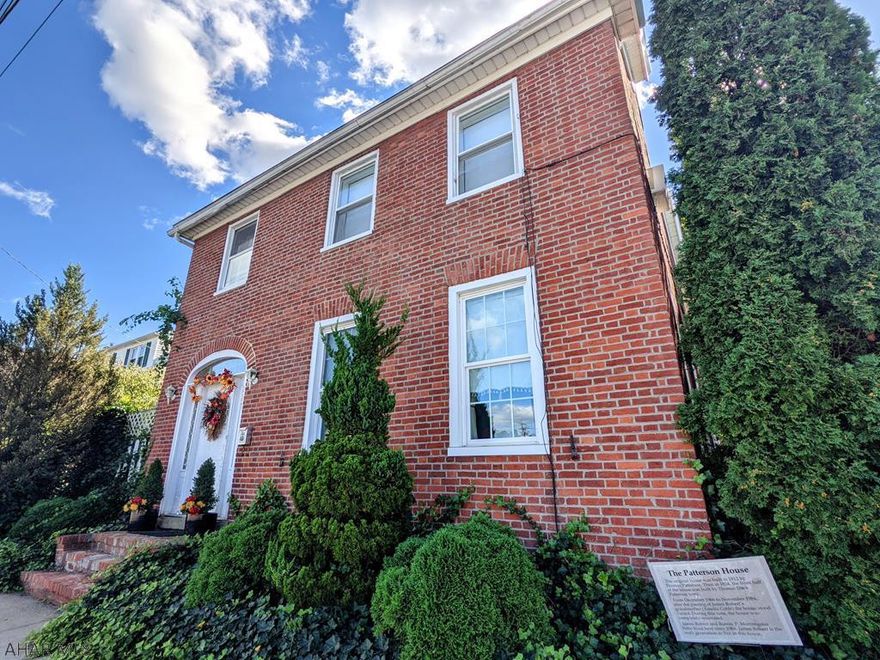 Come and see this gorgeous, updated one of a kind brick home in Williamsburg with phenomenal outdoor space including an above ground pool with custom deck, a canopied patio, an outdoor art studio, a fenced yard, beautifully landscaped with trees, flowers, koi ponds, firepit and a shed. Appliances in the shed are also included. The home features 4 bedrooms, 3 baths - full of historic charm and modern amenities. There is all new flooring downstairs including the large open foyer which features a beautiful staircase and 4 original hand carved fireplaces, a nicely appointed kitchen with appliances included and a family room addition that includes a pellet stove. There is also a carport covered parking area. Most custom draperies are included and antique furniture is negotiable.