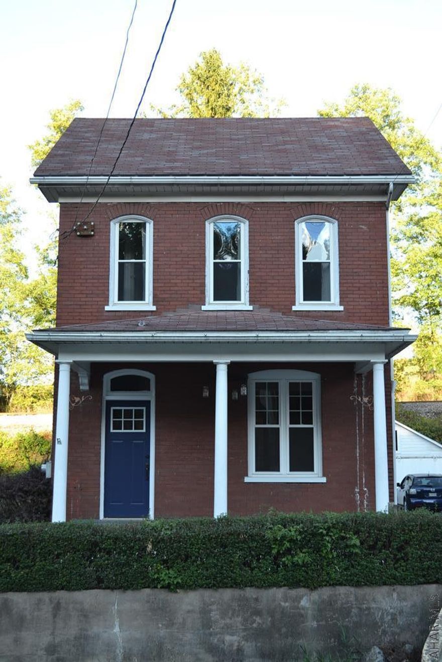 Don't miss this thoughtfully updated home with lovely flooring and design choices! Convenience of first floor laundry, cozy pellet stove and the quiet beauty of the Cove. Stove heats the whole home for low winter heating costs. Newer windows and appliances, including stove, refrigerator, dishwasher, washer, and dryer are all included in sale. It is ready to go! You won't find another home in this condition at such a low monthly payment, even with a small flood insurance policy!