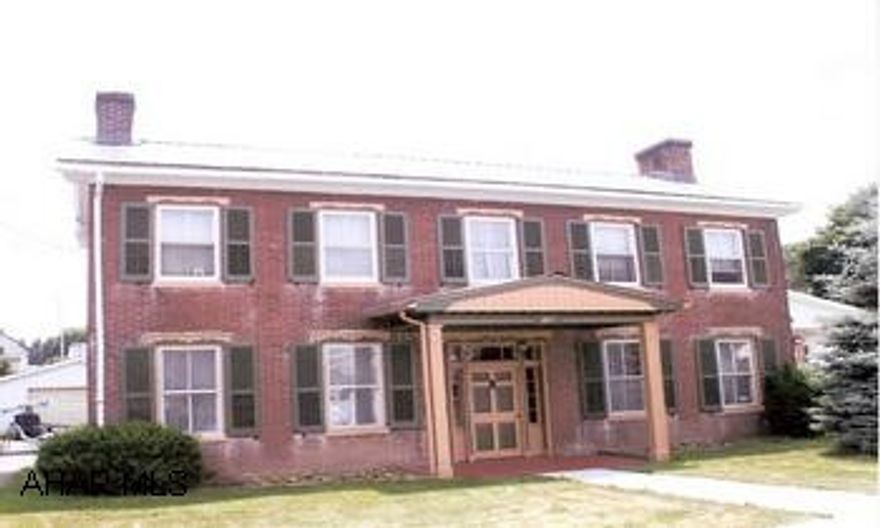 Historic Simon Ling House built circa 1864. Historic Simon Ling House built circa 1864, located in historic town of Bedford. Experience the victorian charm of this 2-story brick home. Welcoming foyer; front 2 rooms, the library and parlor, have been restored to their elegant historic character. Eat-in kitchen, formal DR w/chandelier; spacious family room, open stairway. Upstairs has 3BR, full bath, laundry room, and bright and cheery sun porch. Detached 1-car garage. Level back yard. Zoned Historic District.