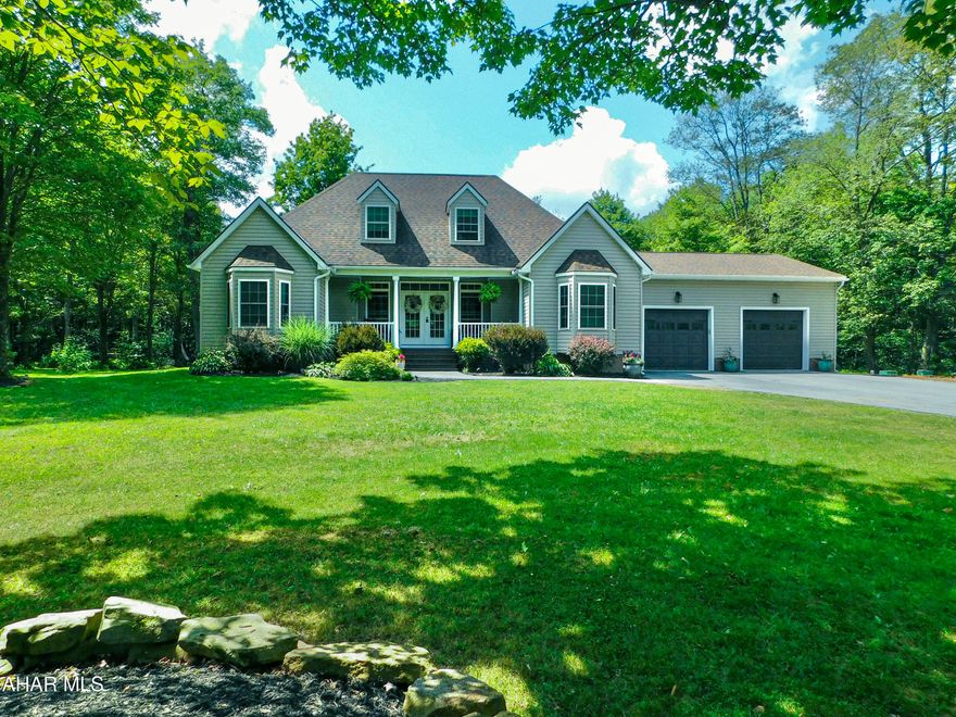 Welcome to the charm that is 1933 Coupon-Gallitzin Road. A True Entertainer's Dream!
This flawlessly designed 4 bedroom, 3 bathroom home is nestled on a serene 2 acre lot. Offering the perfect blend of luxury and functionality, this property is made for those who love both comfort and entertaining.
Step inside to find a jaw-dropping kitchen featuring 2 fantastic pantries, modern cabinetry, and an expansive island, ideal for gatherings or gourmet cooking. The open-concept living and dining areas flow seamlessly, filled with endless natural light and stylish finishes throughout.
The spacious primary suite offers a private retreat with a spa-like ensuite bathroom and incredible walk in closet. The additional bedrooms provide plenty of space even featuring a second primary suite option located on the main floor! 
Outside, the incredible outdoor entertaining area steals the show. Whether you're hosting summer BBQs, evening cocktails, or enjoying quiet mornings surrounded by nature. A large private deck, lush landscaping, and ample space for a pool or garden make the possibilities endless.
Additional features include an oversized 2 car garage, amble parking along the newly paved driveway, generous storage, an outdoor furnace, and, of course, the peace and privacy only a 2 acre property can provide.
Don't miss your chance to own this exceptional home that truly has it all!