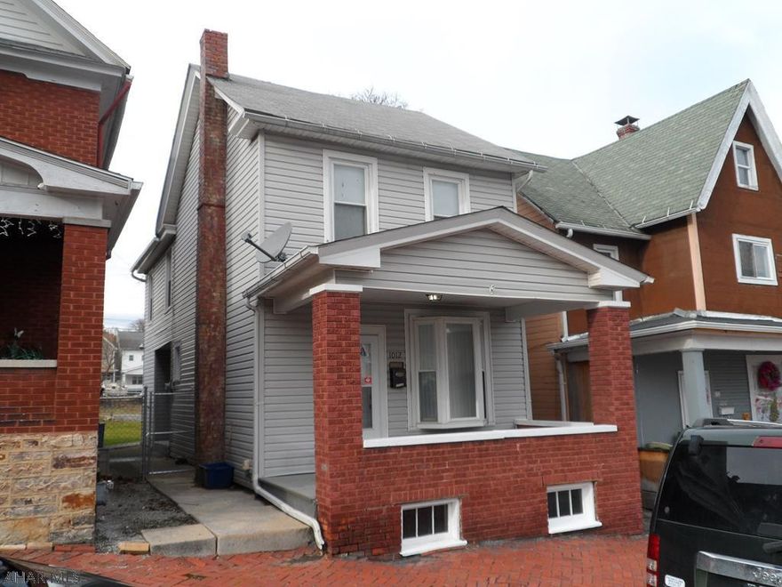 Move in ready!  Totally remodeled inside & out.  New siding, windows, kitchen and bath.  All new drywall throughout, finished attic & fenced yard.  Off street parking.