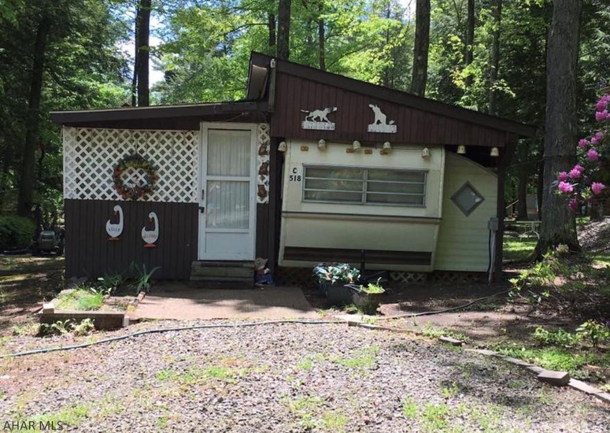 Property being sold as is condition and with contents and appliances.  Has large 200+ square foot enclosed porch with stove for entertaining.