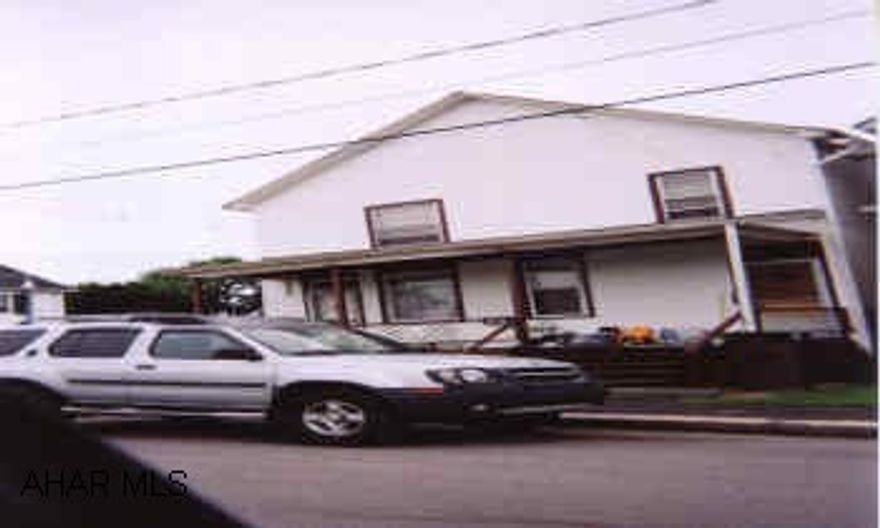 duplex with 1st and 2nd floor apts.   great location buy with 1003 and 1023/25 as a package for a reduced price