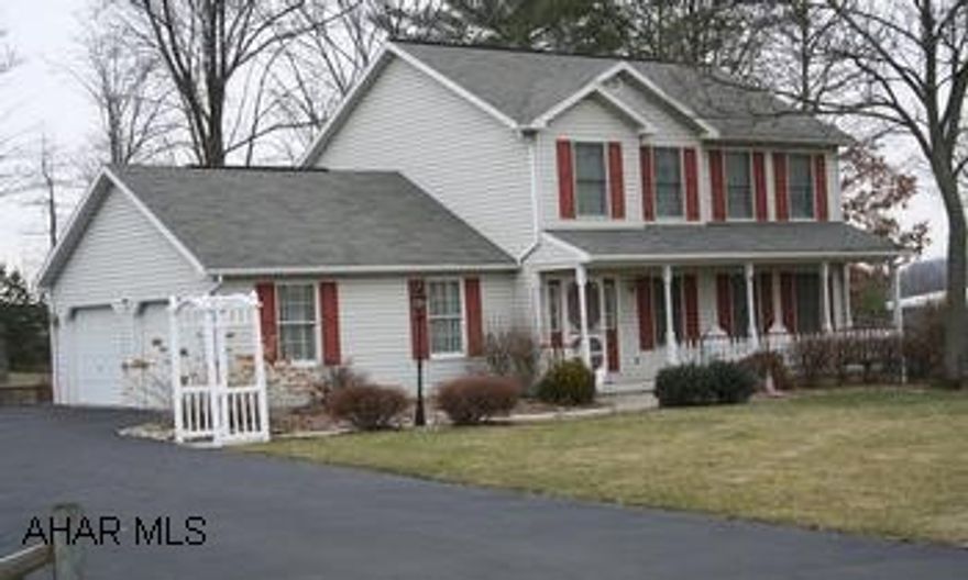 Impressive 2-story vinyl home w/shutters; located in ideal residential neighborhood. 2-Story vinyl home w/shutters; 3BR, 2 full 1 half baths. Eat-in kitchen with granite countertops and island; dining room w/chandelier,  living room, cheery sunroom w/gas stove, cathedral wood ceiling and ceiling fan. Family room in basement. Covered rear deck and patio, large back yard great for entertaining. 12'x16' outbuilding.