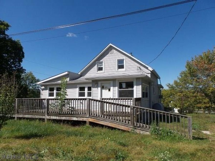 Large lot with cottage style home.