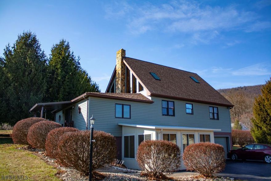 Beautiful custom-built, well-maintained 3 bedroom, 2 bathroom home situated on 1.13 acres in Marklesburg - only a mile from Raystown Lake and the Aitch Boat Launch and Fishing Dock. New energy efficient roof, new furnace, sunroom, knotty pine interior, cathedral ceiling and fireplace are just some of the many features of this property. Plenty of storage with garage, two sheds and carport. Easy commute to Huntingdon, Altoona and State College. Previously used as a year-round residence but would make a great low-maintenance second home or vacation rental.