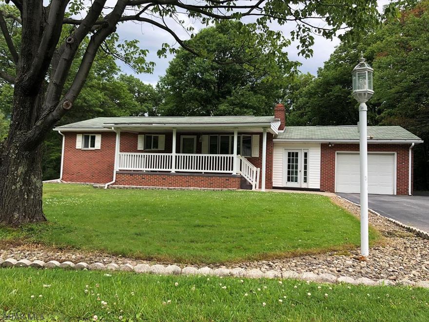 This adorable 3 bedroom 1 story home offers everything you need for country living.  This home is located on a dead end street surrounded by peace and quiet.  The hardwood floors throughout offer a bright and clean atmosphere while the two fireplaces keep you cozy at night.  The kitchen features beautiful handcrafted oak cabinets and a fantastic eat-in buffet island.  The basement offers even more space!  With original, one of a kind barn wood walls, and its own fireplace this basement gives you the perfect rustic feel.  Of course, we can't forget about the garage too!  With all this home has to offer plus .92 acres this home can't be beat!  Contact the listing agent for your private tour today!