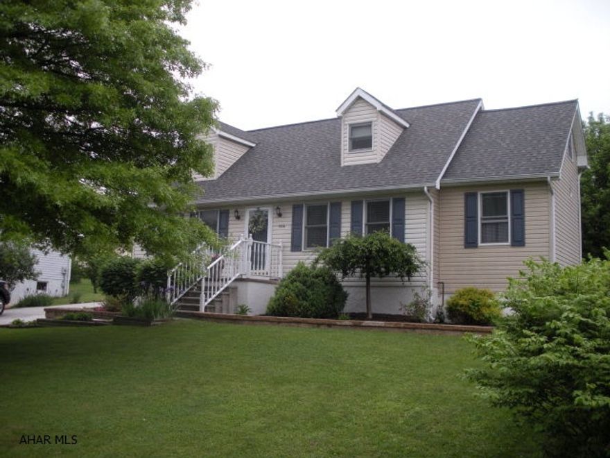 Rolling Hills cape code style home with 4 bedrooms.  3 baths, finished basement, large master suite on 1st floor.  Rear deck, stamped concrete patio, central AC, nice level lot.  2 car carport with attached shed.  New roof (2012), well tank, pump & UV light (2014/2015).  Ready to move into!  1 year AHS Warranty