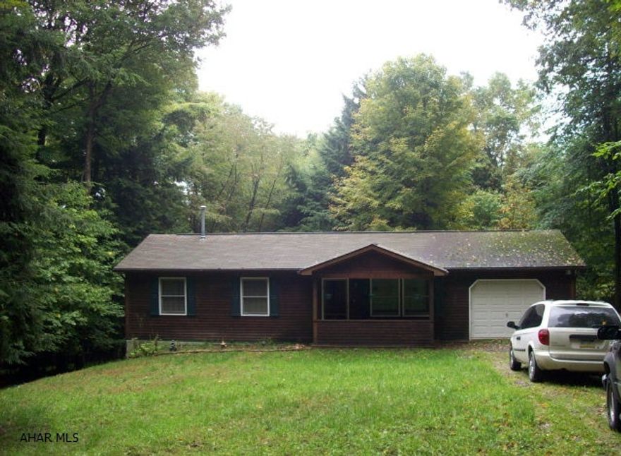 Darling 3 bedroom, 2 bath ranch in private wooded setting.  Five year old furnace with central air, nice rear deck, all appliances included, all the amenities of Glendale Yearound.