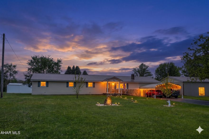 If you are looking for a ranch style home close to town amenities, but far enough away to be your own private sanctuary - this is it! 4 Bedrooms, 2 Baths, a large family room, pantry and plenty of storage space - all on one level! There's an open concept kitchen and dining area... a living room with a gas fireplace and a primary suite with a full bath.  Outside, you have a beautiful gazebo to sit in and relax on those warm summer nights. The fire pit is right next to it and there are several storage sheds on the property as well!  All of this on just under an acre of land!