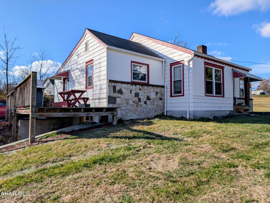 This cozy 2-bedroom, 1-bath ranch sits on a spacious .833-acre lot in Bedford School District, with easy access to town, Route 30, I-99, and nearby amenities, making commuting and daily errands a breeze. Inside, original hardwood floors add timeless character, and the kitchen includes newer stainless-steel appliances, while the living room's stone, wood-burning fireplace creates the perfect spot to unwind on cool evenings. A full basement offers plenty of storage, and an integral garage adds additional parking or storage options.  Whether you're looking for a comfortable place to settle in or a property with room to grow, this home offers classic charm, a convenient location, and plenty of possibilities.