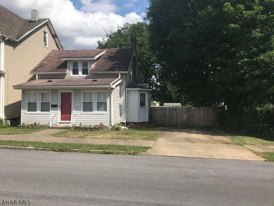 Very cute 1.5 story home with a huge fenced-in lot & 10x14 deck. This 2 BR, 1 full bath  home has been updated & would be a great starter home.  All of the appliances are included...  just move in. Off street parking.