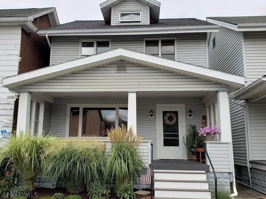 Move-in ready, 3 bedroom home with fresh paint, new flooring, all new light fixtures, updates in bathroom. This home has tons of charm, original wood trim, fenced yard and detached garage.  You can own this home for a lower monthly payment than your rent.  Call the listing agent for a showing.