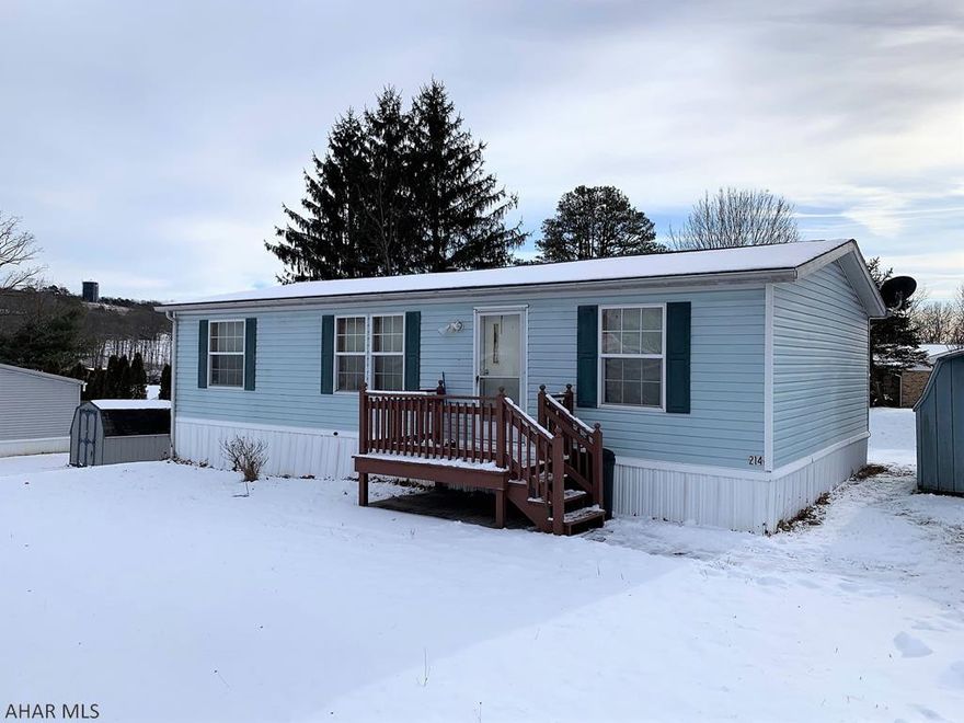Double-wide mobile home offering a living room, kitchen with breakfast bar, master suite with walk-in close and master bath, two additional bedrooms and another full bath. Front and rear decks, 200-ampere electric, oil forced air heat and central air-conditioning. Storage shed and off-street parking. Property is located in Oak Grove Park on a rented lot. Buyer must submit an application to the park and have park approval. Lot rent is currently $277 per month and includes water, sewer, & trash.