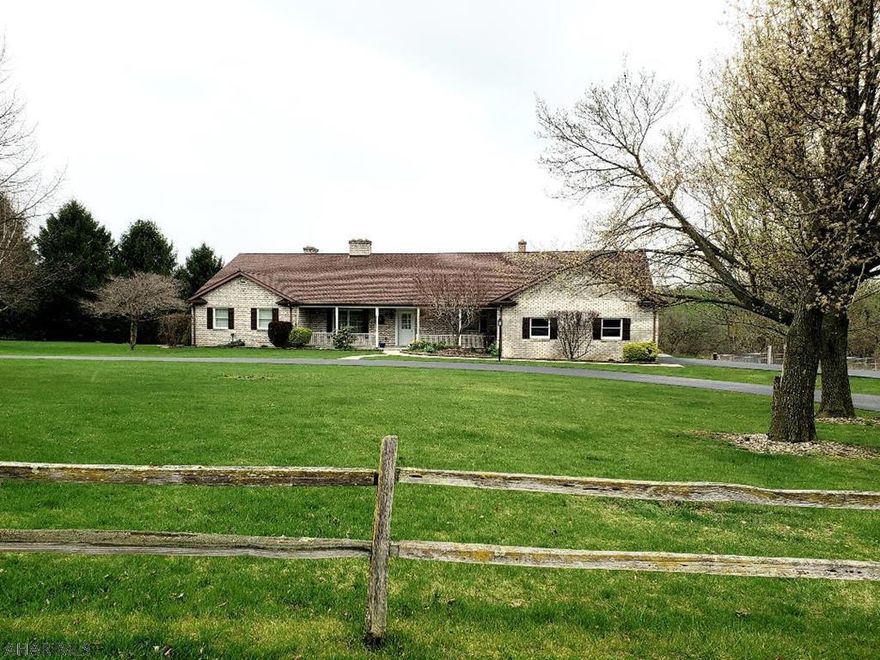 Beautiful 3-bedroom 3-bath brick rancher with hardwood floors, 2 fireplaces, open floor plan, vaulted ceilings & 2-car garage on 1.98 acre country setting.  Inground pool needs new liner.  J-474