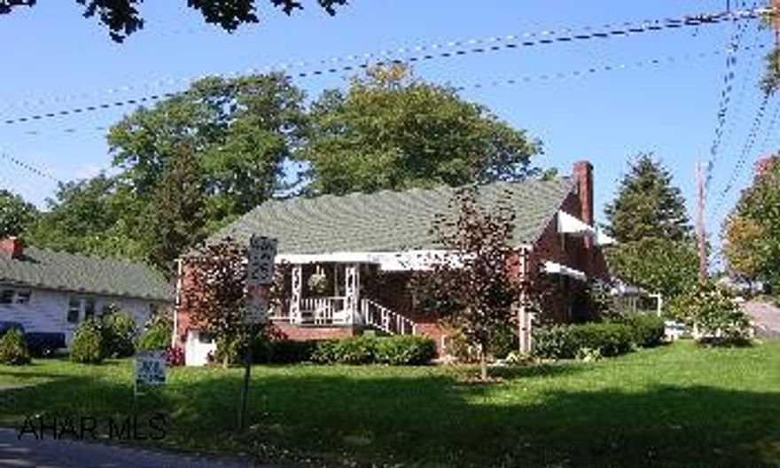 1 1/2 story brick in convenient location. 3 BR, 1.75 BA, 3 seasons room, 2 sheds, gas baseboard heat, central air, and much more.