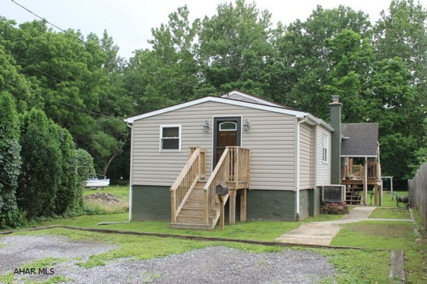 Cute 1 story home tucked away on a dead-end street in Hollidsaysburg Boro. Newer furnace and hot water tank. Central air, large deck to sit and enjoy evenings. Great back yard for entertaining.