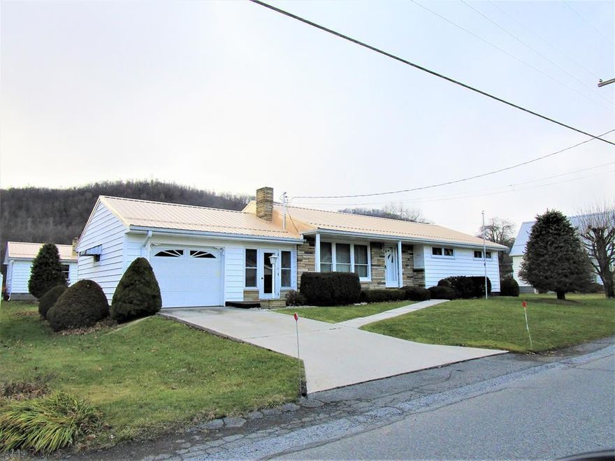 One-owner, home - NICE!   "Window World" windows main (8+-yrs) & base.(fall 2019).  Updated kitchen, bath 1987-like new. Oak trim. HW floors under carpet (kitchen too).  New metal roof summer 2019.  Encl./finish. breezeway.  1-Car att. & 1-car det. garages-newer OH doors-good conc. driveways.  3-Zone "Burnham" OHW furnace 7+-yrs. old heats domestic water (prior consumption 500 to 600 gals.+-/yr).  1,000-gal. polyurethane oil stg. tank in ft. yard (20+-yrs. old).  Aux. wd. furn. in base.-tied into OHW furnace Wood stove in base. fam.rm.  West Penn Power Co.(1 person in home - mo.averages - $55.89-2019; $77.28-2018; $62.99-2017)  Current $88.50/mo. pd. to Hyndman Boro for public water & sewer & trash pick-up(twice/week).  Lot dimensions, ages/dates, GLA approximate - NO warranties implied.