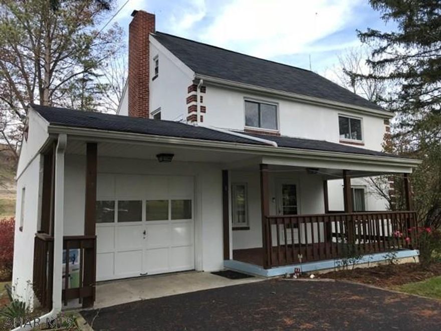 Relax and enjoy the tranquility of the stream winding through this beautifully maintained property with a garden and shed!  This clean and well maintained 3 bed room, 1  bath home has an attached garage, first floor laundry, fireplace with insert in living room, new water heater, new Ultra violet light, and is located on a quiet country road.  Located just off I-99 and close to the PA turnpike, I-70, Shawnee State Park, Blue Knob Ski Resort and State Park, Bedford Omni Springs Resort, Altoona, Johnstown, and Cumberland!  This property would be great for a first-time home buyer, retirement home or second/vacation home.