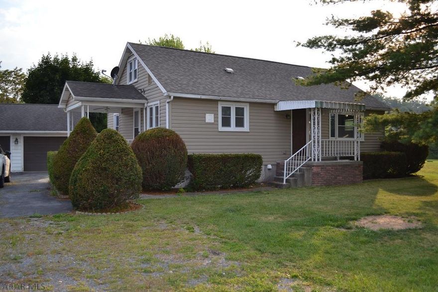 This is a very cute home with lots of space beautiful hardwood floors and lots of potential, new roof and well pump, nice back yard, spacious garage. Move in ready, Partially finished  basement, currently residential but easily could be commercial,. great location. Agent is related to seller.