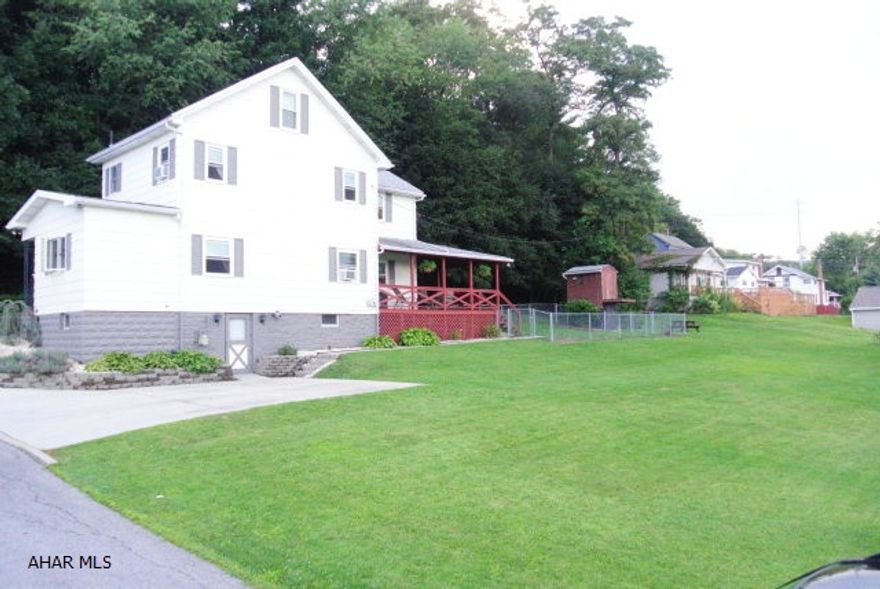 This charming 3 bed 2 bath home has just a beautiful semi-private setting with an enourmous 100 x 120 lot.   Don't let the fence fool you....it is only surrounding a fraction of the yard for the pets and children.   This modern home has spacious rooms, ceramic tile counter tops, stainless steel appliances, new paint, fixtures, and a partially finished basement.   It also offers a wonderful covered deck overlooking the backyard along with a 2 story shed for that extra storage.