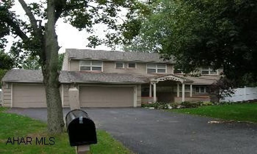 AWESOME CONTEMPORARY STONE AND CEDAR HOME. Offers 4 bedrooms, 2.5 baths, beautiful maple kitchen with Swanstone countertops, hardwood floors, vaulted living/dining area, finished family room, 3 car garage, in-ground pool with patio & deck, nicely landscaped lot. Relocation addendum required with all offers.