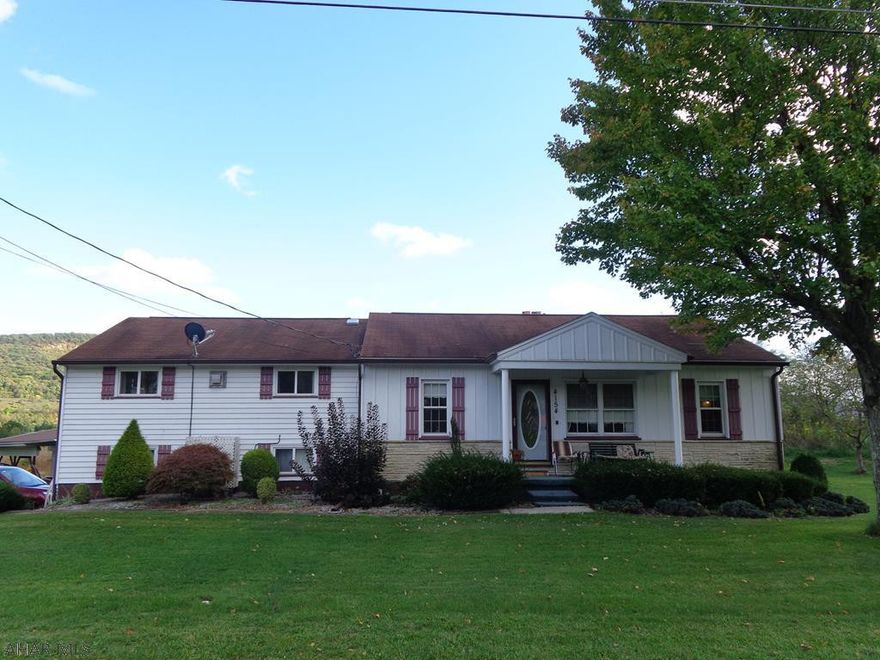 Convenient one story living on 2.11 acres.  This home has so much to offer - Barn with electricity, RV parking, 4 season Sun Room, dry basement.  New A/C (2020), central vac system, newer electric hot water tank & furnace, whole house fan, eat in kitchen.  1st floor laundry.  Spacious Family Room with fireplace built over the garage.