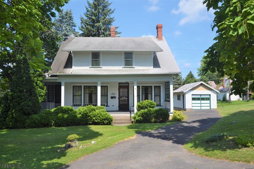 HUGE PRICE DROP! Looking a home in East End, with a large yard, AND loads of curb appeal (that porch!!!)?  Then check out this home!  This 3 BR, 1 BA home has close to a half acre yard (150 x120) with plenty of space on either side and a 1 car garage.  Wraparound porch out front that continues around the back as an enclosed porch.  Beautiful woodwork downstairs with an open dining and living room area.  Upstairs has 3 bedrooms (2 good sized, 1 captive) and a bath. This is a TRUE GEM in a great neighborhood!  Add your personal touches and this one will become something REALLY special.  Call for your showing today!  AS IS-seller to make no repairs.