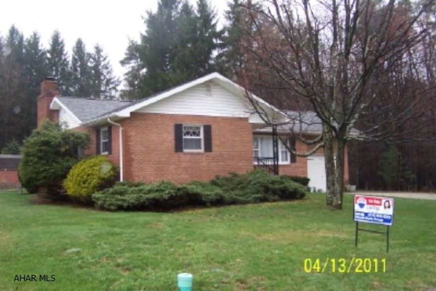 Only Steps Away From The Ghost Town Trail. This 1-story brick home is on 6/10 of an acre (partly wooded) and is located clear to the back of Mylo Park. It has a huge fenced-in backyard, a stick-built shed, a covered front porch, a garage, a cement driveway, city water and city sewer. The inside has 3 bedrooms, 1.5 baths, a beautiful oak eat-in kitchen, a living room with french doors, a 900 square foot family room with a wood burning fireplace, an open bar area, and a large laundry room. If you want privacy and zero traffic, this is the home for you. Priced to sell.