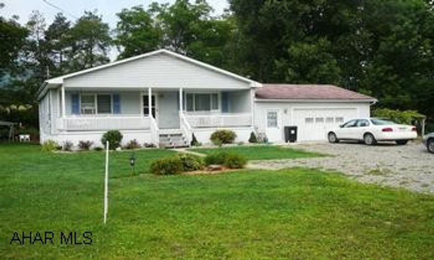 REALLY NICE RANCH ON A LARGE LEVEL LOT.  MODERN KITCHEN AND BATH.  HEATED FINISHED GARAGE. COVERED PAVILION.  FLOOD INSURANCE ONY $36.00/MONTH.