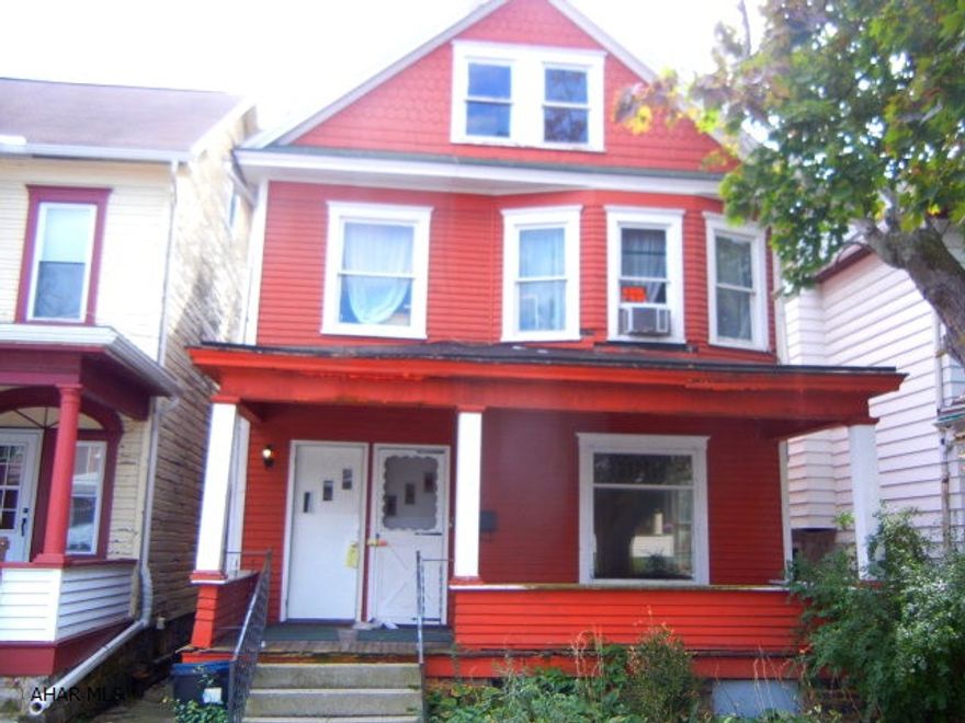 Duplex with separate utilities.  Two GFA furnaces (one is new), 2 hot water tanks, fenced back yard.  Needs some work.
